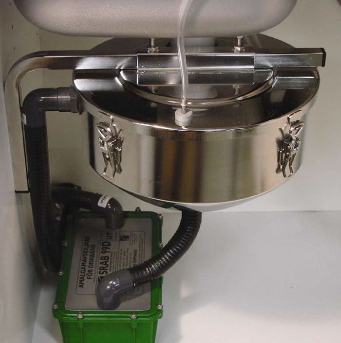 Amalgam separators (pictured) can be easily attached to dental chairs to capture waste mercury, keeping it out of waterways.